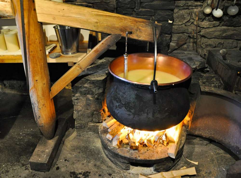 Fondue-preparation-in-Gruyeres-Switzerland